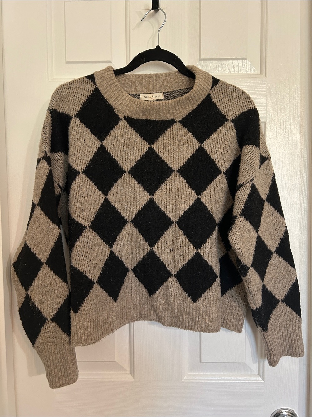 Shop Stevie Black and Beige Argyle Crewneck Sweater